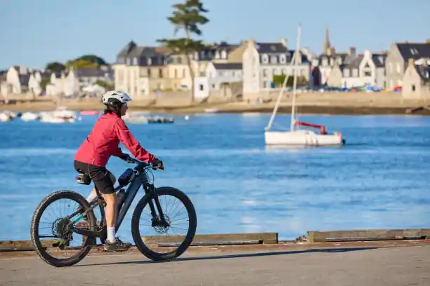 woman riding near the ocean