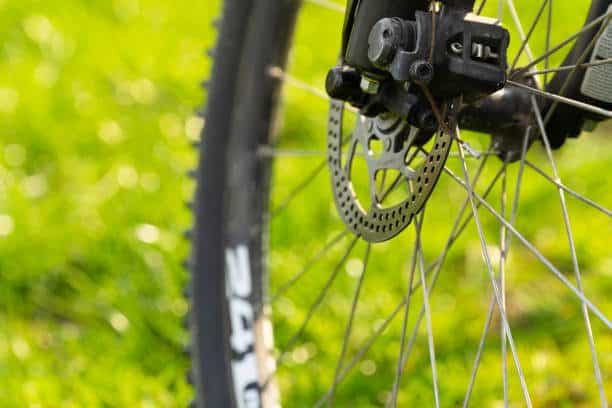 Close up of a mountain bike disc brake caliper
