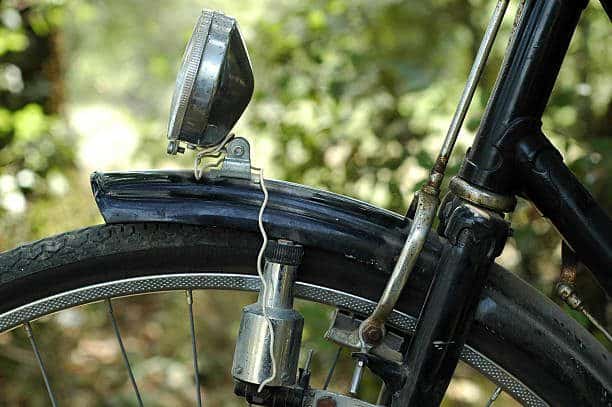 Close up of a headlamp and a dynamo. Too, a concept for ecology, rural life and life outdoors.