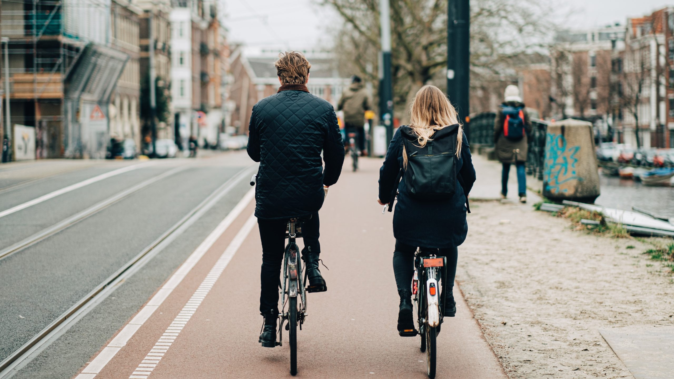 two people riding an e-bike