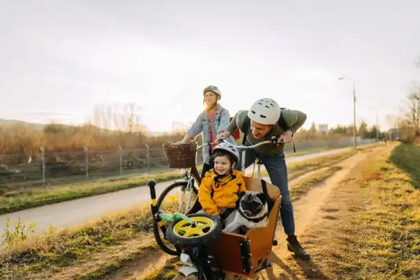 family riding cargo-ebike