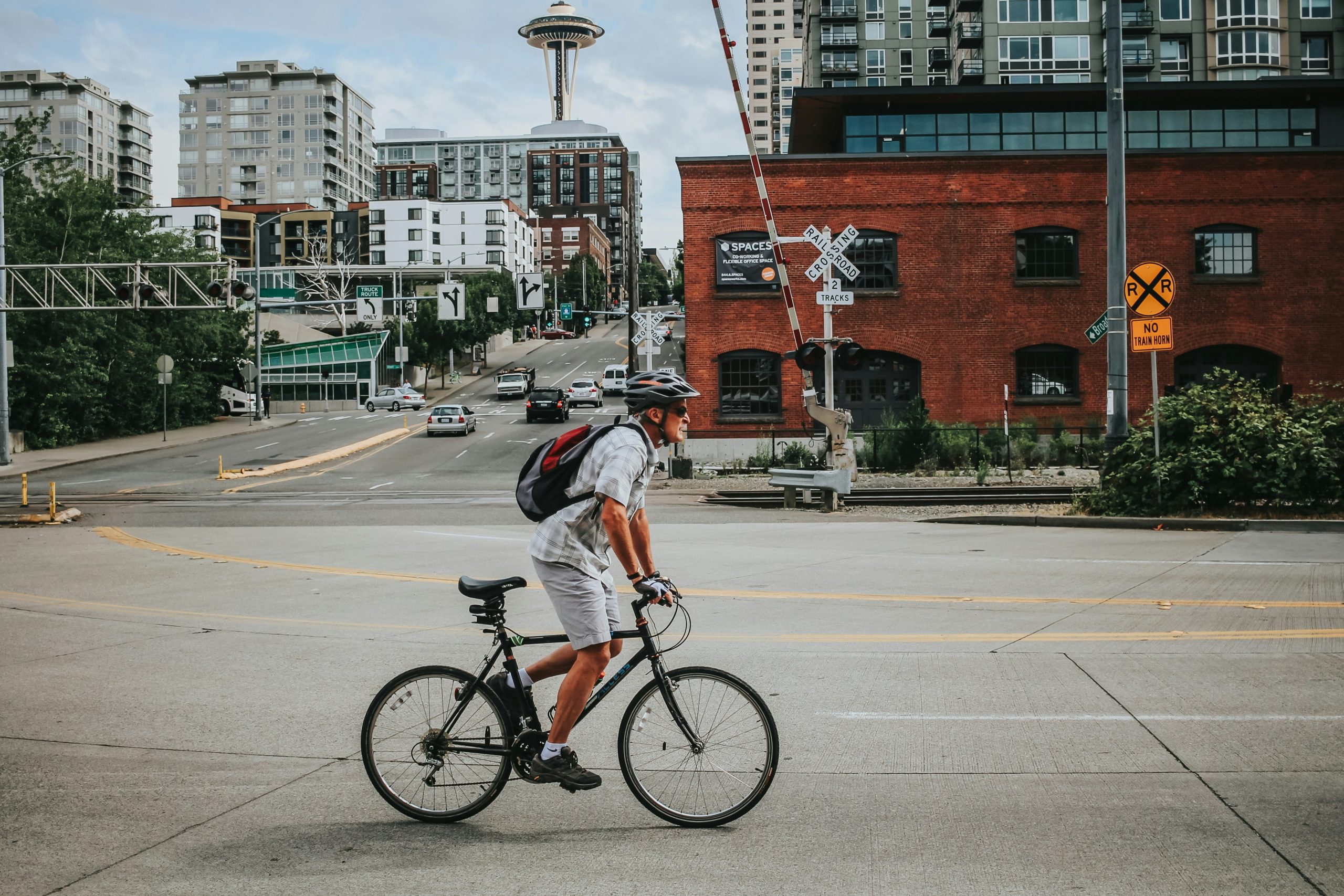 man riding an e-bike on the road