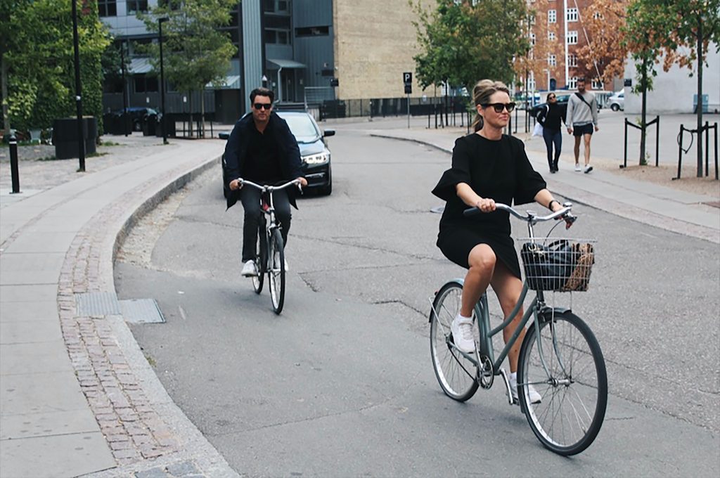 two people riding an e-bike
