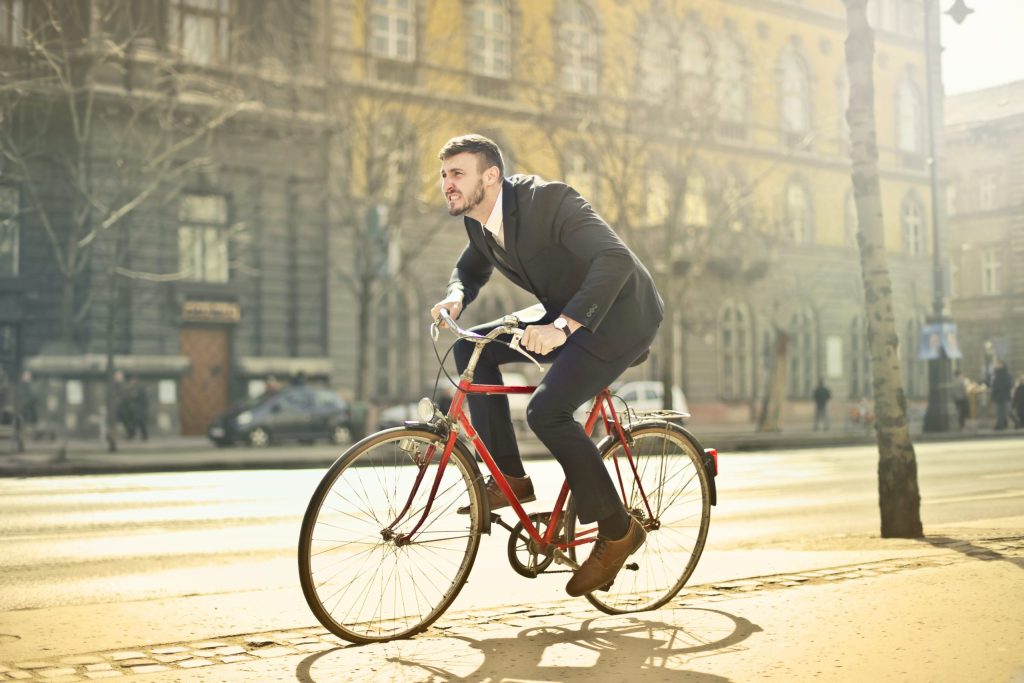 man riding e-bike