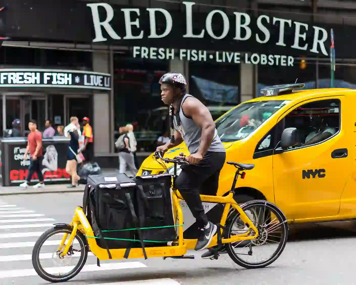 man riding cargo bike