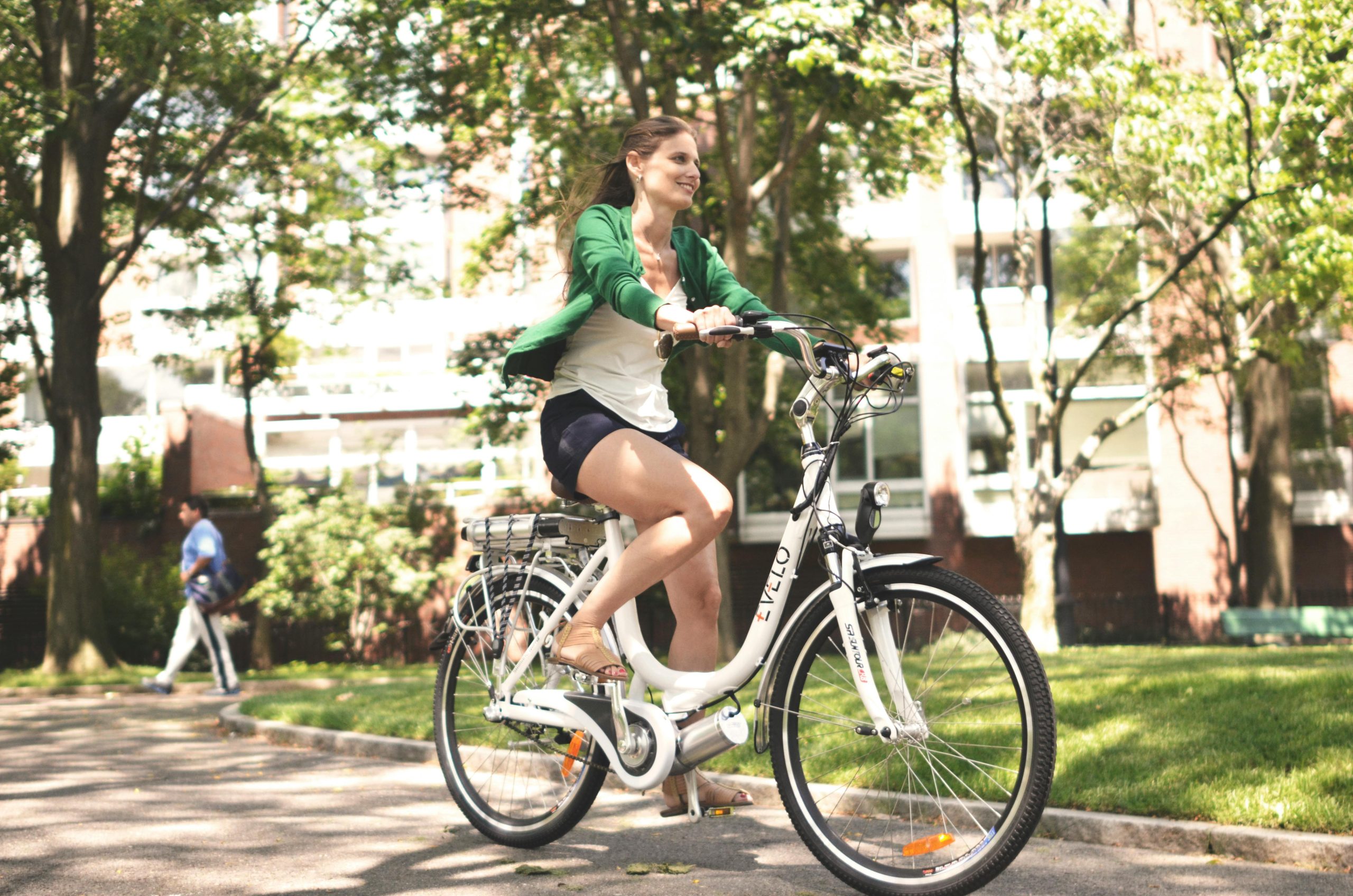 woman riding e-bike