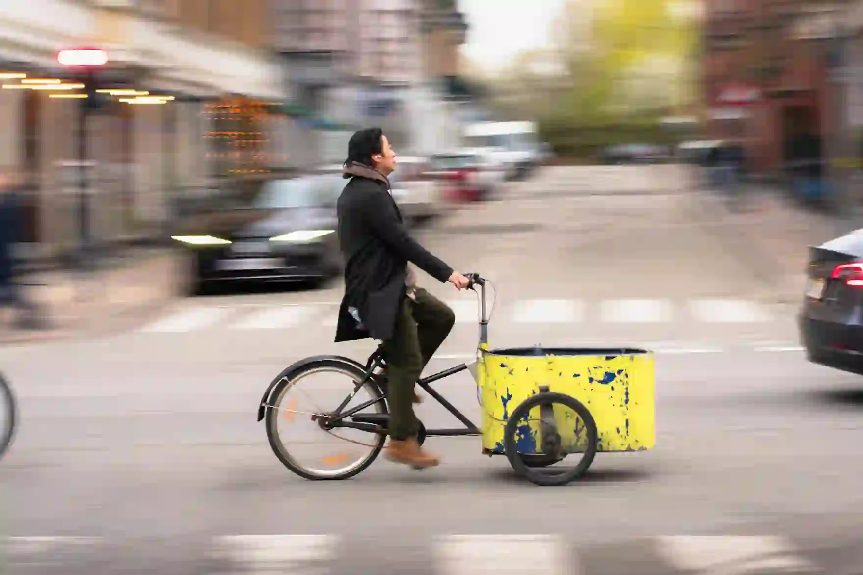 woman riding cargo bike